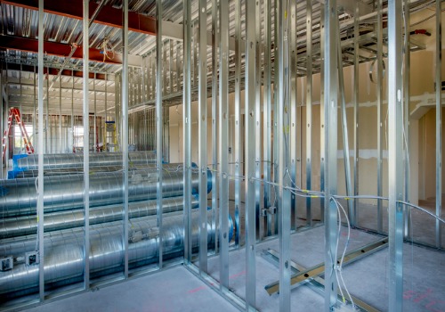 The metal framing of walls before drywall during Interior Framing and Design in Peoria IL